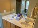 Well-lit bathroom with a double vanity, separate shower, and tub, offering a spa-like experience at 5298 Autumn Run Dr, Powder Springs, GA 30127