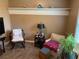 Cozy room featuring carpeted floors and assorted furniture at 5298 Autumn Run Dr, Powder Springs, GA 30127