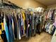 Walk-in closet with ample hanging space for clothing and storage above at 5298 Autumn Run Dr, Powder Springs, GA 30127