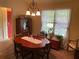 Inviting dining area with natural light and a view of the outdoors at 5298 Autumn Run Dr, Powder Springs, GA 30127