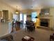 Spacious living room with stone fireplace, neutral tones, and open floor plan at 5298 Autumn Run Dr, Powder Springs, GA 30127