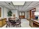 Finished basement with a table and chairs creating an inviting flex space at 5335 Bannergate Dr, Johns Creek, GA 30022