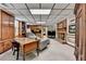 Finished basement featuring a brick fireplace, built-ins, and neutral decor at 5335 Bannergate Dr, Johns Creek, GA 30022