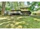 Exterior view of the back of the home from the backyard at 6419 Danbury Ln, Norcross, GA 30093