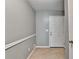 Clean entryway with light gray walls, white trim, and a white front door at 6419 Danbury Ln, Norcross, GA 30093