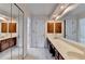 Large primary bath featuring a double sink vanity with a wall-to-wall mirror at 478 Guilford Cir, Marietta, GA 30068