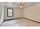 Bedroom featuring neutral walls, trim, carpet, a window, and ceiling fan at 478 Guilford Cir, Marietta, GA 30068