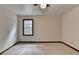Bedroom featuring neutral walls, trim, carpet, and a window providing natural light at 478 Guilford Cir, Marietta, GA 30068