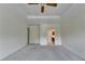 Bedroom featuring a tray ceiling, ceiling fan, neutral paint and lots of natural light at 478 Guilford Cir, Marietta, GA 30068