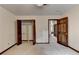 Bright bedroom featuring a large closet with doors and light carpet, ready for personal touches at 478 Guilford Cir, Marietta, GA 30068
