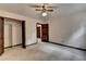 Spacious bedroom with a ceiling fan, large closet, carpet flooring, and natural light at 478 Guilford Cir, Marietta, GA 30068