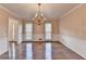 Bright dining area features gleaming hardwood floors and natural light at 478 Guilford Cir, Marietta, GA 30068