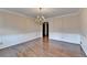 Traditional dining room featuring a chandelier and hardwood floors at 478 Guilford Cir, Marietta, GA 30068