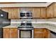 Traditional kitchen featuring granite countertops and wood cabinetry at 478 Guilford Cir, Marietta, GA 30068