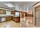 Open kitchen with stainless steel appliances and wood cabinetry at 478 Guilford Cir, Marietta, GA 30068