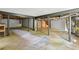 Unfinished basement showing support beams, duct work, and access to stairs at 1125 Murray Sw Cir, Marietta, GA 30064
