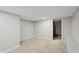 Basement room featuring clean carpet and freshly painted neutral walls at 1125 Murray Sw Cir, Marietta, GA 30064