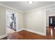 Dining Room with hardwood floors and doorway views into the kitchen and the front door at 1125 Murray Sw Cir, Marietta, GA 30064