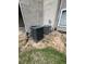 Outdoor AC units sitting on a grassy area near the building exterior at 3575 Oakvale Rd # 1103, Decatur, GA 30034