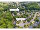 An aerial view of the neighborhood highlighting the home's location and nearby swim and tennis facilities at 417 Rhodes House Dr, Suwanee, GA 30024