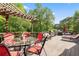 Large deck with glass table, dining chairs, a grill, and outdoor lounge furniture at 417 Rhodes House Dr, Suwanee, GA 30024