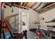 Basement gym area with exercise equipment and exposed ceiling at 417 Rhodes House Dr, Suwanee, GA 30024