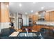 Stylish kitchen with stainless steel appliances, granite countertops, and ample cabinet space at 417 Rhodes House Dr, Suwanee, GA 30024