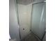 Modern bathroom with enclosed shower, tiled floor, and good lighting at 5028 Highway 81, Mcdonough, GA 30252