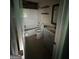 Cozy bathroom featuring a tub, toilet, vanity, and tiled floor at 5028 Highway 81, Mcdonough, GA 30252