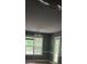 Cozy bedroom with natural light, trim, and a door to the outside at 5028 Highway 81, Mcdonough, GA 30252