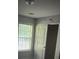 This bedroom offers natural light and a spacious closet with good storage solutions at 5028 Highway 81, Mcdonough, GA 30252