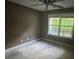 Empty bedroom with hardwood floors and a window providing natural light at 5028 Highway 81, Mcdonough, GA 30252
