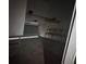 Spacious garage with overhead door and shelving at 5028 Highway 81, Mcdonough, GA 30252