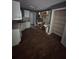 View of the kitchen, including cabinetry and appliances at 5028 Highway 81, Mcdonough, GA 30252