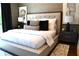 Luxurious main bedroom featuring plush bedding, stylish pillows, and modern nightstands at 1350 May Avenue # 14, Atlanta, GA 30316