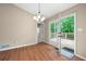 Dining area with a view to the outdoor deck and a light fixture at 2445 Deerfield Nw Dr, Kennesaw, GA 30144