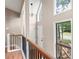 Well lit foyer with stairs, wood and metal railing, and lots of natural light at 2445 Deerfield Nw Dr, Kennesaw, GA 30144