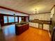 A modern kitchen features stainless steel appliances and a gas cooktop island at 325 Northmill Pkwy, Stockbridge, GA 30281