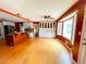 Spacious kitchen features wooden floors, orange accents, and a breakfast bar at 325 Northmill Pkwy, Stockbridge, GA 30281