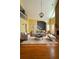 Bright living room with hardwood floors, fireplace, high ceilings, and neutral furniture at 325 Northmill Pkwy, Stockbridge, GA 30281