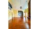 Spacious living room with hardwood floors, fireplace, and high ceilings at 325 Northmill Pkwy, Stockbridge, GA 30281