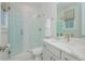 Contemporary bathroom featuring a glass-enclosed shower, sleek vanity, and modern fixtures at 750 Tannery Cmn, Alpharetta, GA 30009