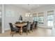 Dining room features a large wood table and ample natural light at 750 Tannery Cmn, Alpharetta, GA 30009