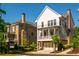 Beautiful two-story home with a brick foundation, welcoming front porch, and a well-manicured yard at 750 Tannery Cmn, Alpharetta, GA 30009