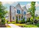 Beautiful two-story home with a brick chimney and well-maintained landscaping at 750 Tannery Cmn, Alpharetta, GA 30009