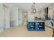 Open concept kitchen featuring a large island with counter seating and modern fixtures at 750 Tannery Cmn, Alpharetta, GA 30009