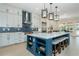 Spacious kitchen with large island, seating, modern appliances, and custom cabinets at 750 Tannery Cmn, Alpharetta, GA 30009