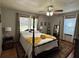 Spacious bedroom featuring a comfortable bed and ample natural light at 2059 Clearwater Se Dr, Marietta, GA 30067
