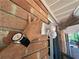 Exterior wall shows a wrist watch and motion detector for extra security at 2059 Clearwater Se Dr, Marietta, GA 30067