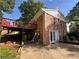 This two-story home has a walk out basement, exterior brick, and a deck at 2059 Clearwater Se Dr, Marietta, GA 30067
